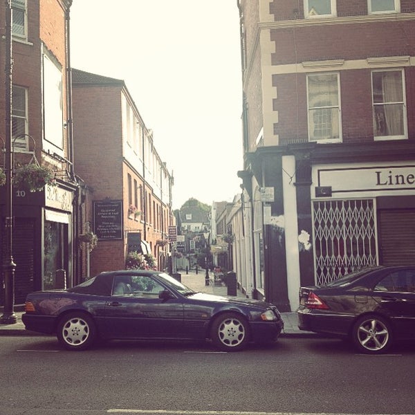 Photo taken at Hampstead High Street by Aleksey R. on 7/29/2015