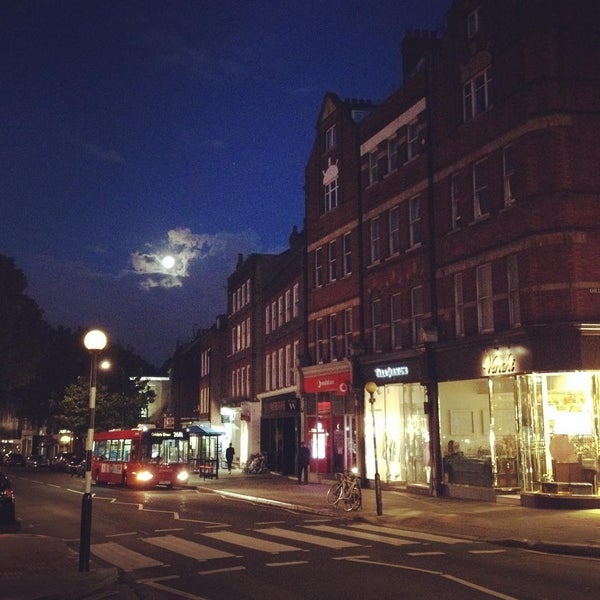 Photo taken at Hampstead High Street by Aleksey R. on 7/30/2015