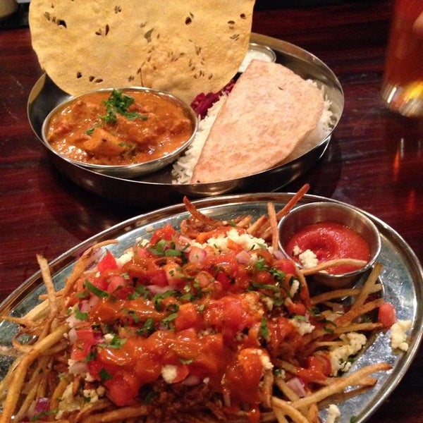 Photo taken at Mela Indian Restaurant by Ekta R. on 5/26/2014