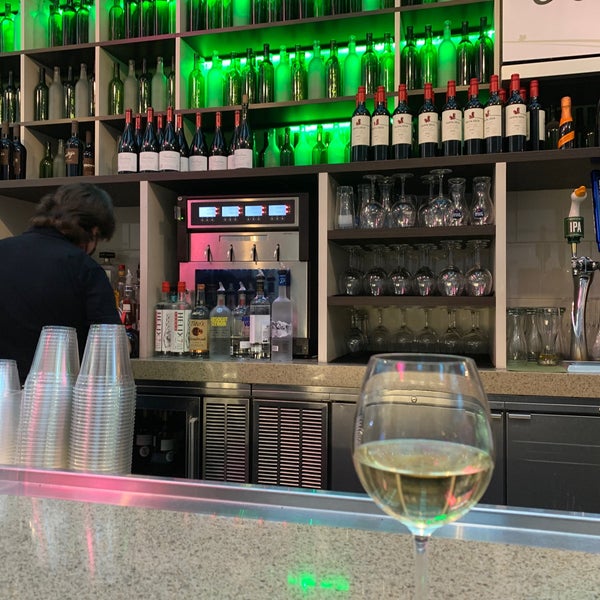 Relax, grab a glass of wine (expensive but you’re in an airport, it’s expected), and meet interesting people. Hold a conversation, perhaps you’ll form a bond, perhaps be strangers passing by.