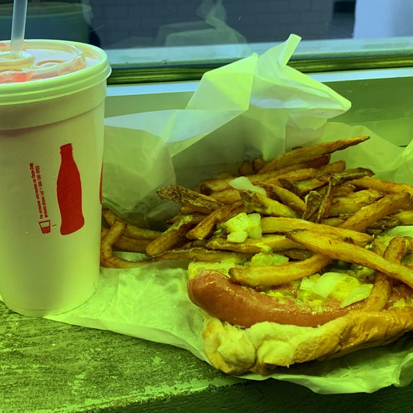 Place of legend for hot dog aficionados, the classic depression dog - not dragged thru the garden but minimal relishes & topped with fries.  Must get w red creme soda! Looks simple yet tastes so good.