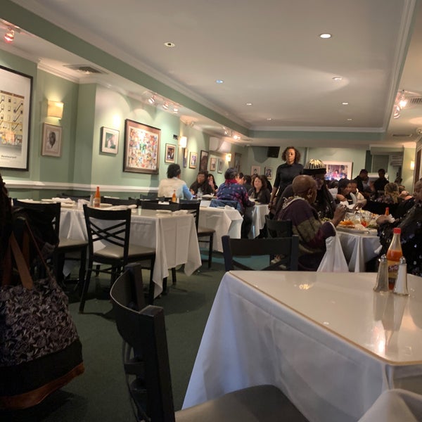 Photo taken at Sylvia&#39;s Restaurant by Kevin H. on 3/3/2019