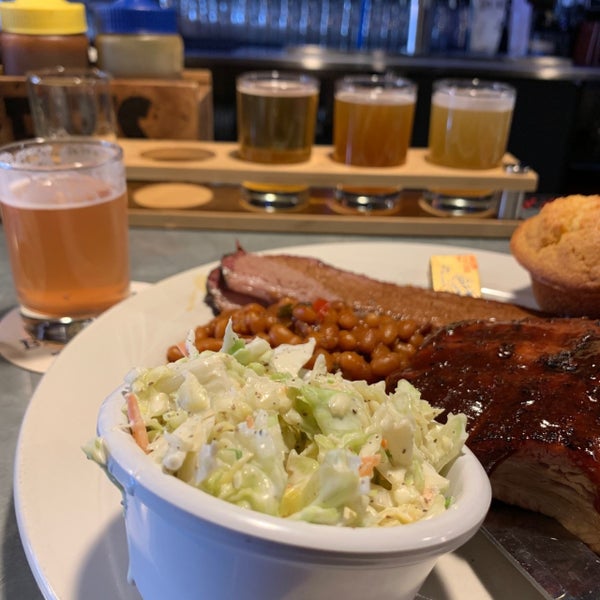 Photo taken at Blue Tractor BBQ &amp; Brewery by Chad W. on 4/6/2019