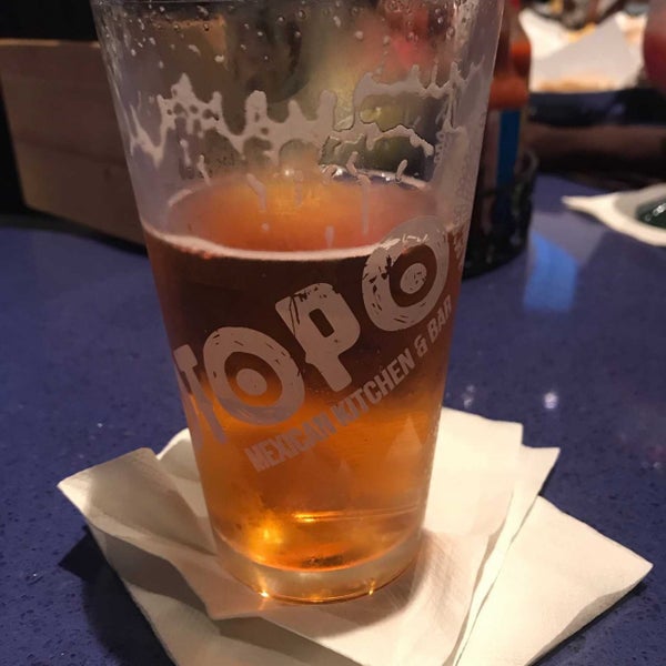 Photo taken at Totopo Mexican Kitchen and Bar by Ryan on 2/8/2019