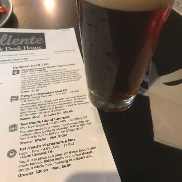 Photo taken at Caliente Pizza &amp; Drafthouse by Ryan on 3/13/2021