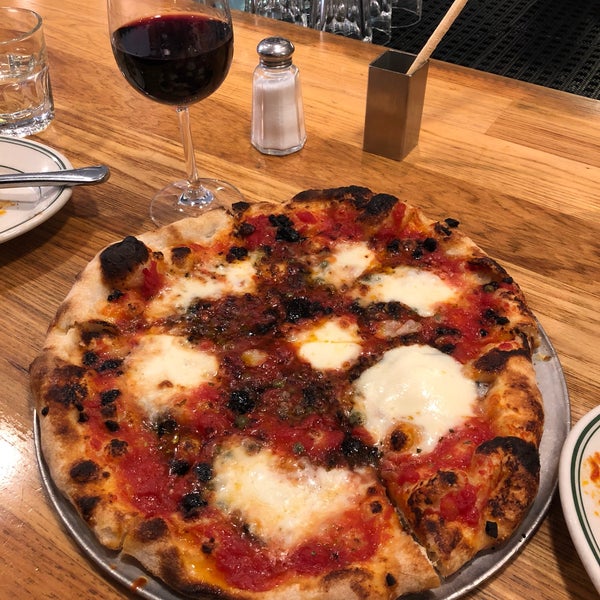 Photo taken at Pizzeria Delfina by Dante C. on 9/2/2018