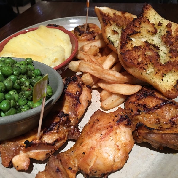 Photo taken at Nando&#39;s by Aaron A. on 12/12/2016