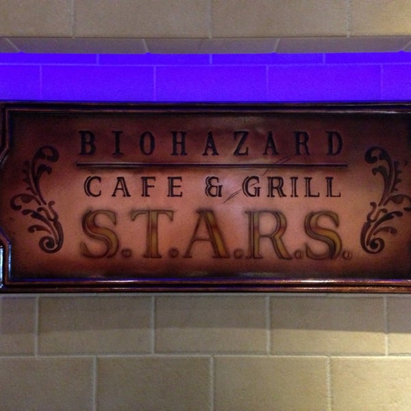 Photo taken at Biohazard Café &amp; Grill S.T.A.R.S. by T on 6/26/2013