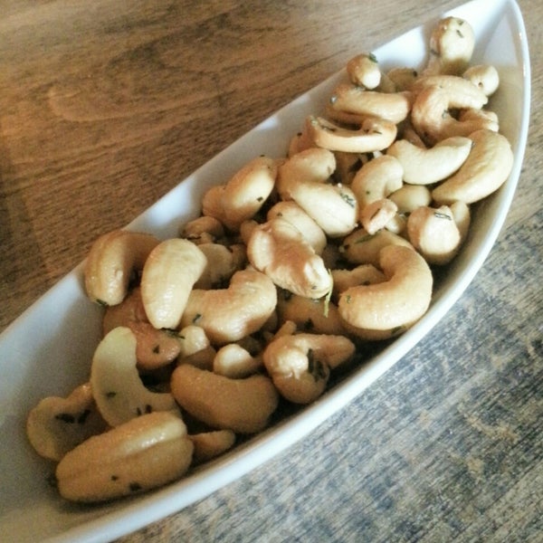 Cashew nuts with rosemary are a great nar snack that pair well with the whiskey cocktails here.