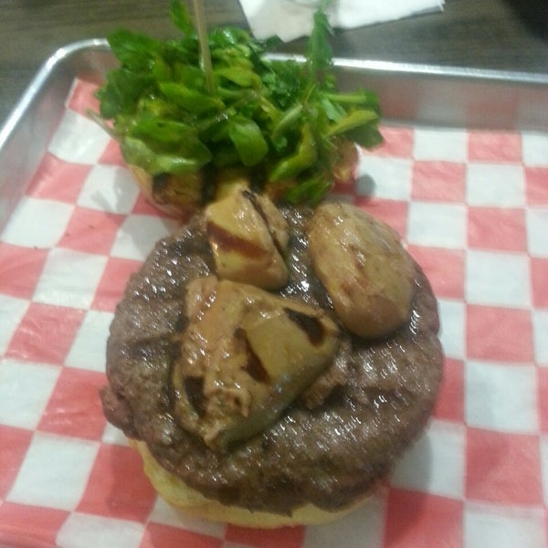 The Jean-Louis is one decadent burger! It's topped foie gras, rhubarb, mach and truffle aioli!