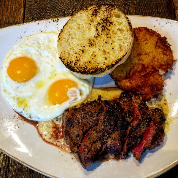 The Grilled Flat Iron Steak and Eggs is probably one of the best you'll  get anywhere! Prepared rare, with sausage gravy, and a crispy breakfast potato.