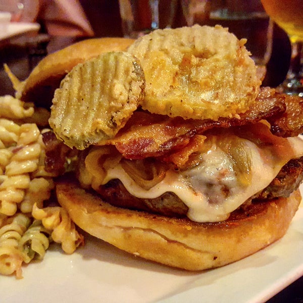 The eponymous burger is the real deal! Ground wagyu and sirloin, smoked mozzarella, sautéed onions, fried pickles, bacon, & peach ketchup along with a side of fries or pasta salad.