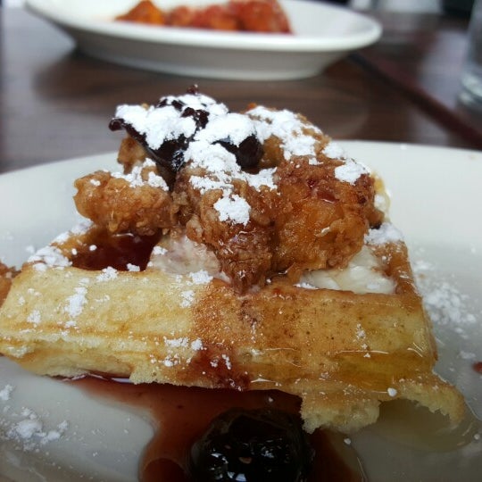 The Fried Chicken & Waffle topped with black cherries & honey butter is a cruchy delight.