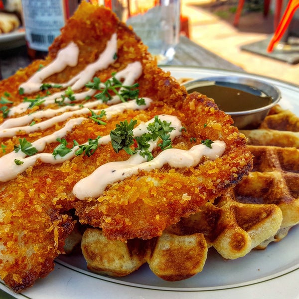 Brunch is all about the Chicken Schnitzel Waffle. Crispy fried chicken over soft and fluffy Waffle drenched in maple syrup.