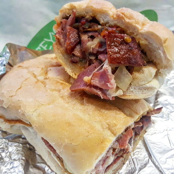 All about the Hot Sicilian Sub made with capicola ham, salami, and provolone cheese with onions, hot pepper relish, and Italian dressing.