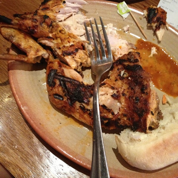 Photo taken at Nando&#39;s by Musi M. on 4/15/2013