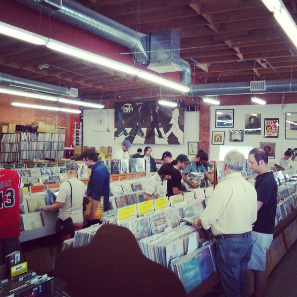 Photo taken at Record Surplus by Ian R. on 4/20/2013