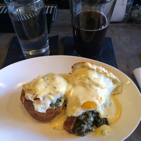 Popover with kale and sunny side egg? Delicious! Like an eggs Benedict inside a wonderful popover pastry.