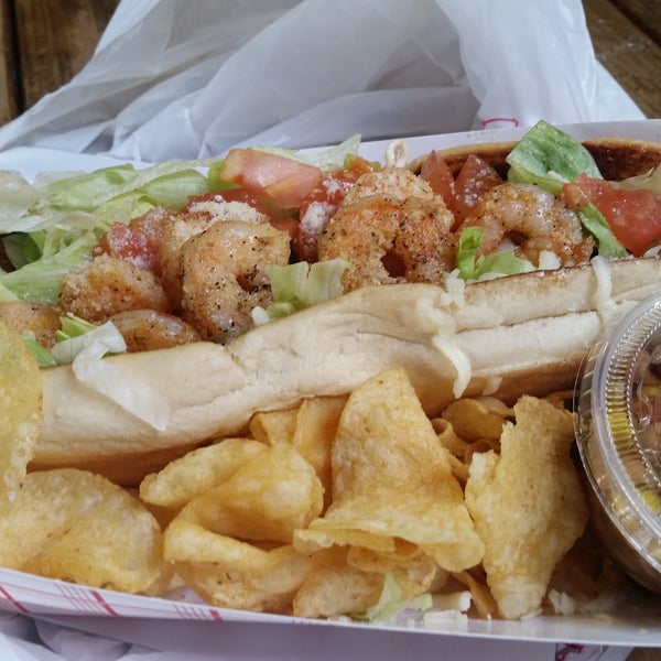 Tasty shrimp scampi po boy, but the sandwich is long and they didn't cut it in half, which sucks for my tiny lady hands.
