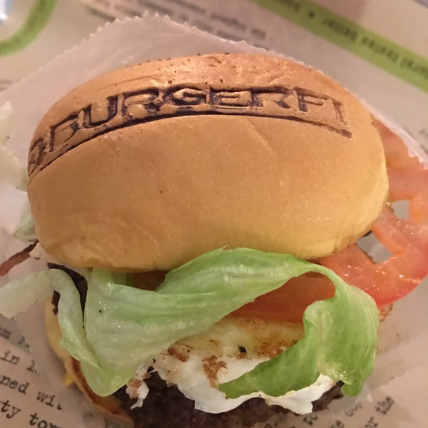 Photo taken at BurgerFi by Tim Y. on 11/21/2015