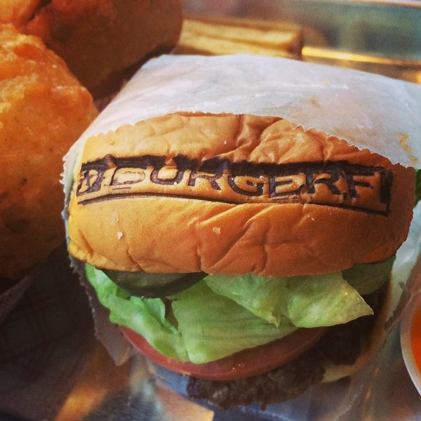 Photo taken at BurgerFi by Tim Y. on 2/7/2014