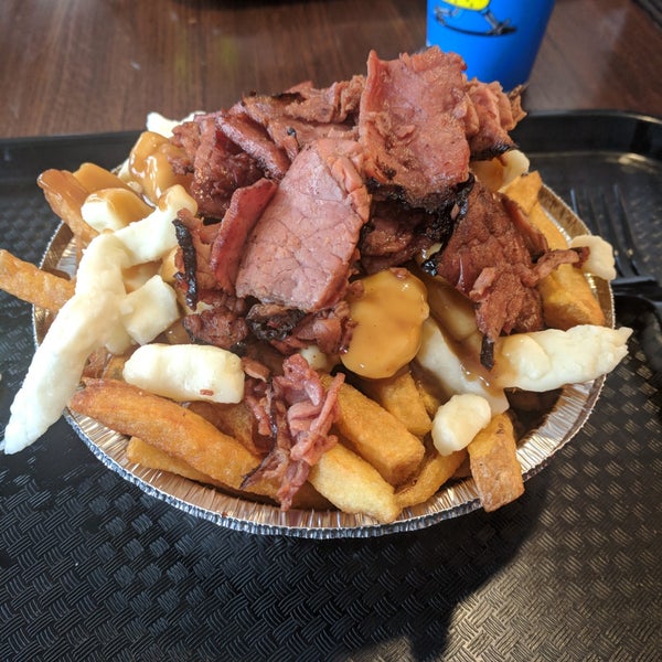 Photo taken at 514 Poutine by Michael J. on 1/12/2018