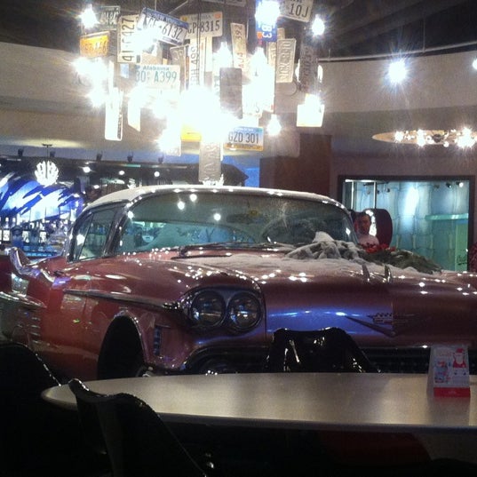 Photo taken at The Pink Cadillac by Vlad M. on 12/19/2012