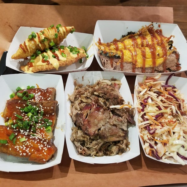 Photo taken at Kimchi Smoke Barbecue by Andrew L. on 3/4/2018
