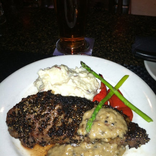 Photo taken at The Keg Steakhouse + Bar - Colorado Mills by Forrest W. on 2/19/2013