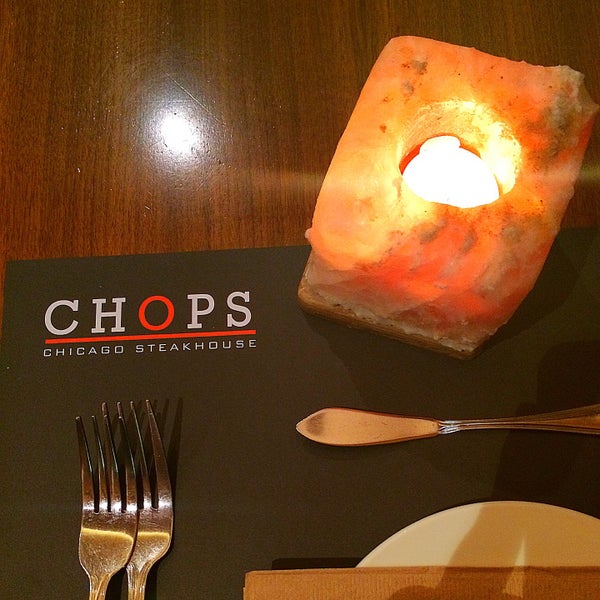 Photo taken at Chops Chicago Steakhouse by Aryan M. on 4/7/2015