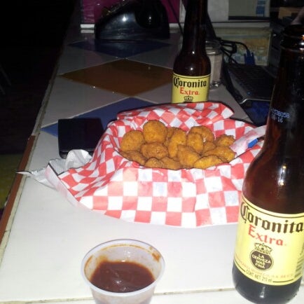 Photo taken at KICH Wings &amp; Beer by Everardo N. on 2/1/2013