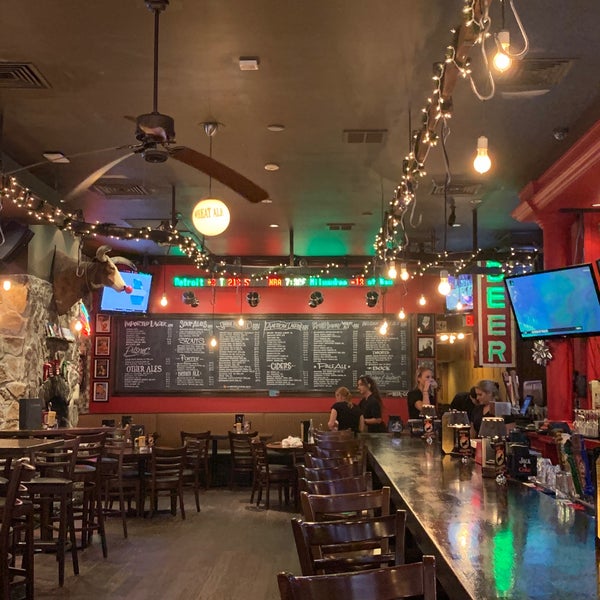 Photo taken at Grease Burger, Beer and Whiskey Bar by Cathy W. on 12/21/2019