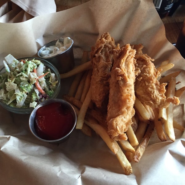 Photo taken at Spike Africa&#39;s Fresh Fish Bar &amp; Grill by Jordan D. on 3/26/2015