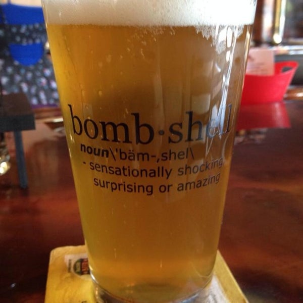 Photo taken at Bombshell Beer Company by Matthew C. on 5/9/2014