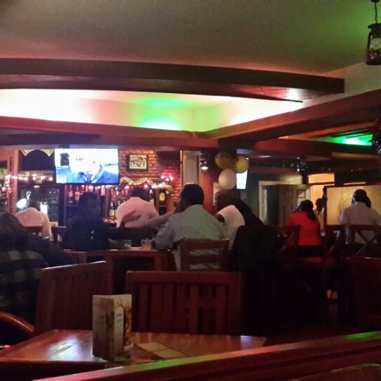 Photo taken at The Well Irish Pub &amp; Restaurant by Nabeel H. on 12/23/2013