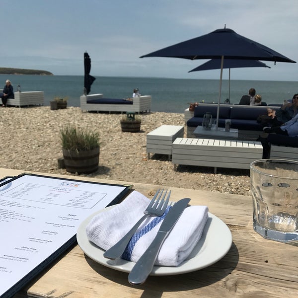Foto diambil di Navy Beach Restaurant oleh Georgiana M. pada 5/19/2019