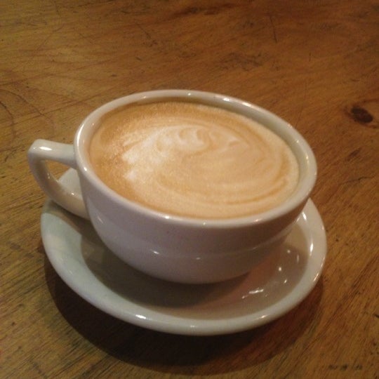 Photo taken at Mojo Coffee by Mihalis on 12/5/2012