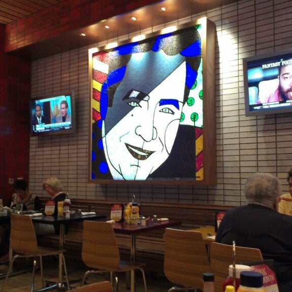 Photo taken at Burgers and More by Emeril by George W. on 10/2/2013