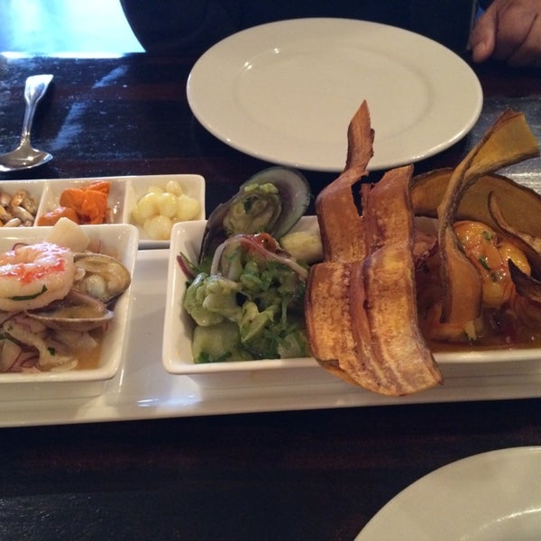 Photo taken at Sazón - Peruvian Cuisine by Kathy T. on 4/10/2014