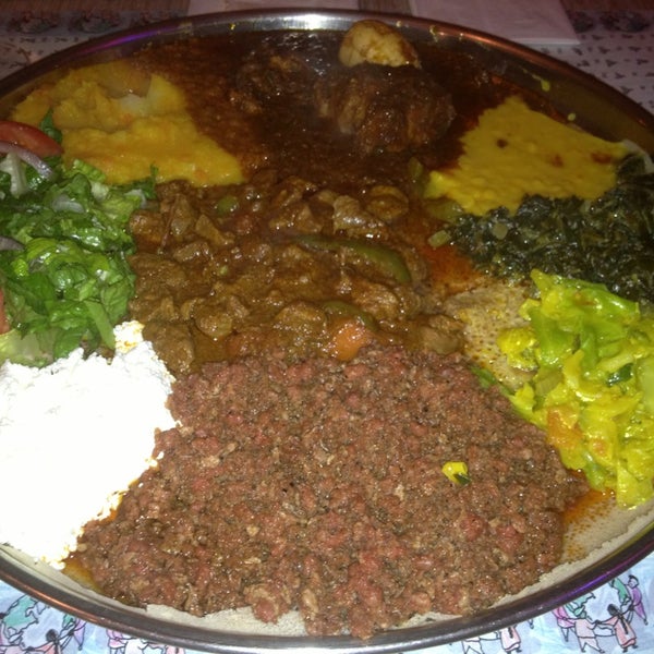 Photo taken at Queen Sheba Ethopian Restaurant by Paul B. on 2/10/2013