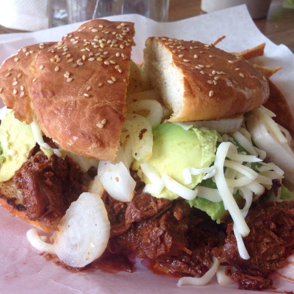 The beef adobada cemita is delicious especially when you drizzle the red chipotle sauce. The sandwich is a structural mess but it's still a glorious thing. There is no air conditioning.