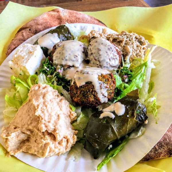 The falafel is freshly fried. The dolma/ stuffed grape leaves are good.