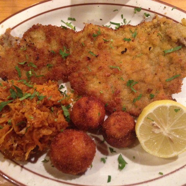 The veal schnitzel is nice and crispy. The sides like the grandma's sauerkraut are warm and the Bavarian tater tots are crispy and creamy. Free wifi and great beer selection.