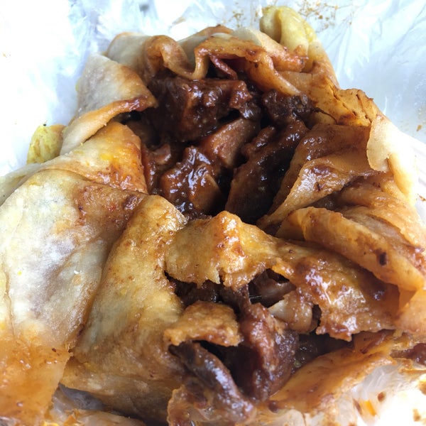 The oxtail roti is spectacular, the roti takes an additional 15 minutes to make but it is definitely worth it. They have a wide variety of juices on tap. There is ten seats and the bar tables are high