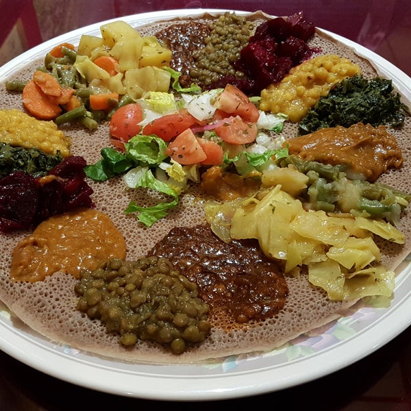 The classic Injera Veg plate is as delicious as ever at a reasonable price surrounded with  great atmosphere & accompanied with a Guinness Stout ("The Brown Beer" to the staff). Finger Lickin' good!