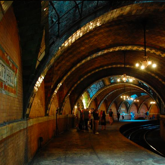 If on the 6 going downtown, convince your conductor to stay on the train while it loops back around to go uptown. Very cool tour of the long-abandoned City Hall station on the way.