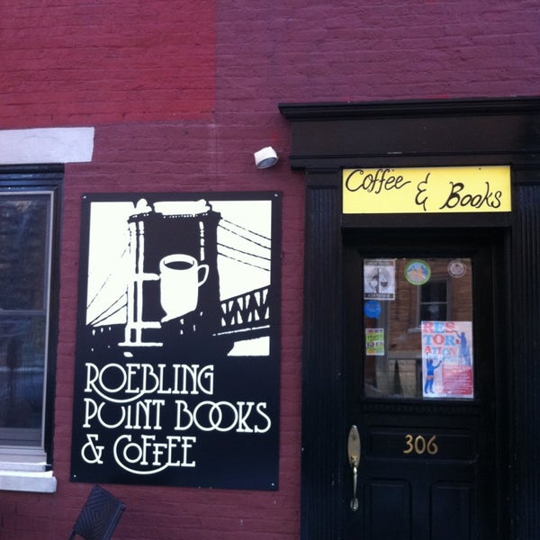Photo taken at Roebling Point Books &amp; Coffee by Shannan B. on 2/1/2013