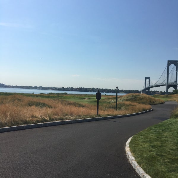 Photo taken at Trump Golf Links at Ferry Point by Adam R. on 6/20/2016