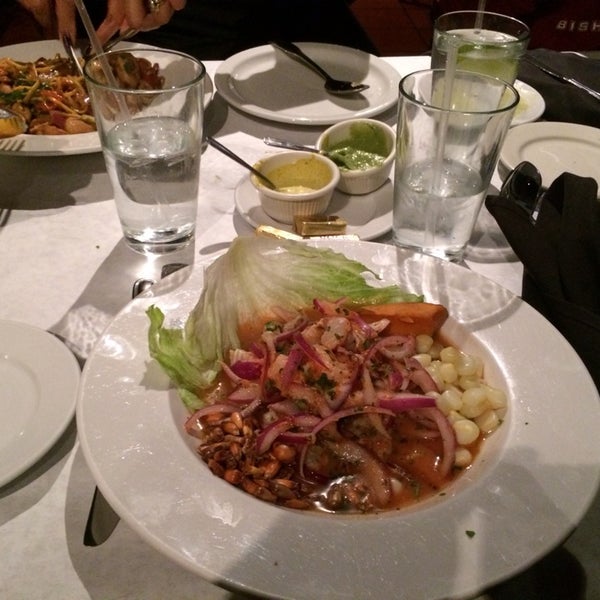 Photo taken at Lola&#39;s Peruvian Restaurant by Carlos Q. on 11/25/2013