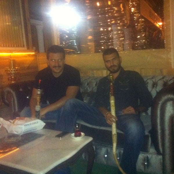 Photo taken at Ottoman Hookah Lounge by Cenk C. on 7/12/2013